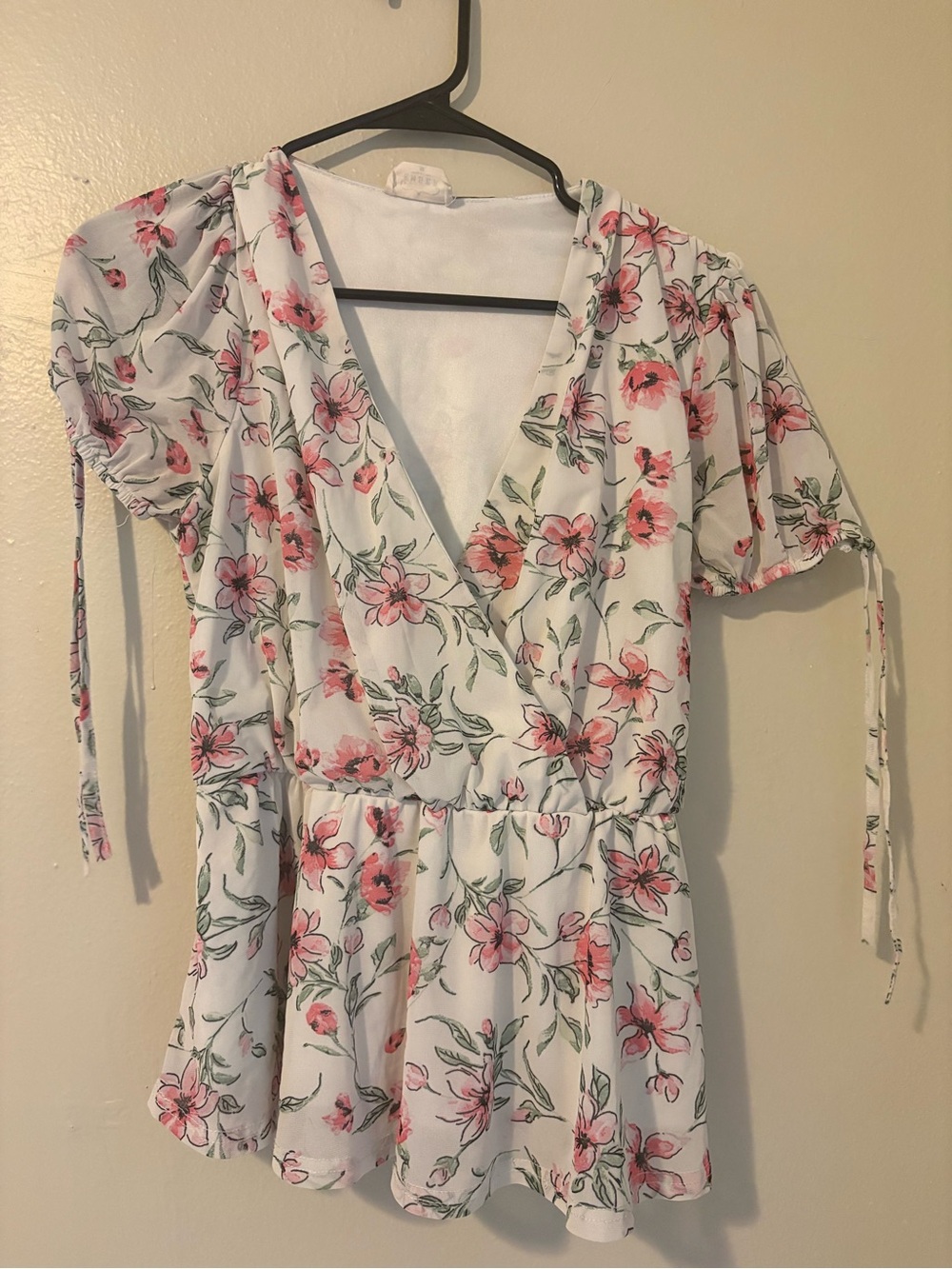 Women’s White Floral Wrap Peplum Top - size M